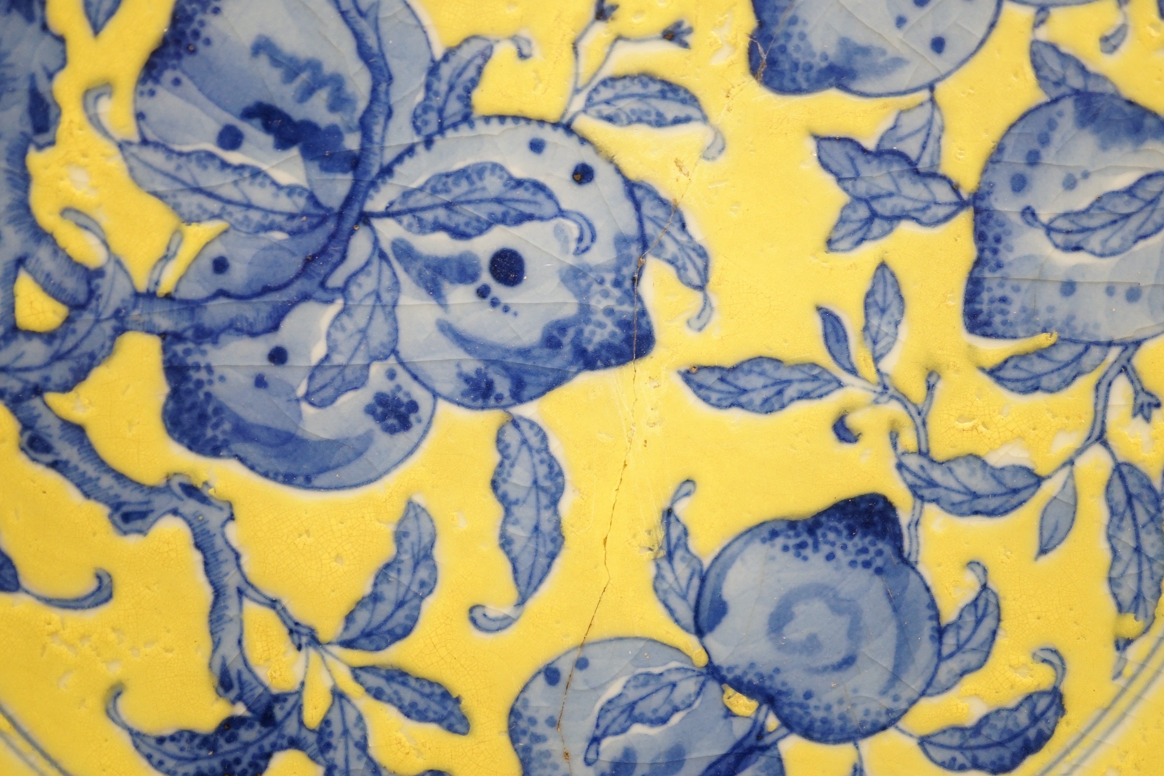 A Chinese yellow ground dish a/f. 28cm